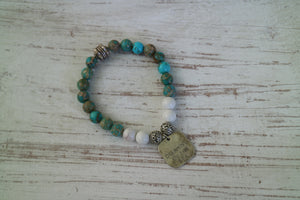 Blue Sea Sediment Jasper and white howlite gemstone beaded bracelet with rustic silver 'dreaming of the sea' charm