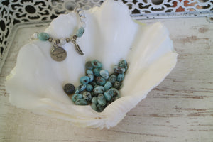 White Howlite beaded bracelet with Larimar nugget beads and a silver 'mermaid soul' and boho feather charm