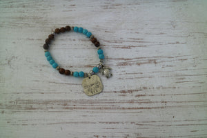 Blue howlite gemstone and wood beaded bracelet with silver rustic 'dreaming of the sea' and turtle charms