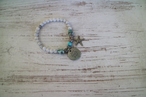 White Howlite and Larimar nugget beaded bracelet with silver 'live laugh love' and starfish charm