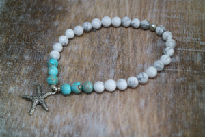 White howlite and blue sea sediment jasper gemstone beaded bracelet with silver starfish charm