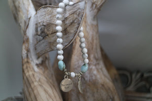 White Howlite beaded bracelet with Larimar nugget beads and a silver 'mermaid soul' and boho feather charm
