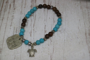 Blue howlite gemstone and wood beaded bracelet with silver rustic 'dreaming of the sea' and turtle charms