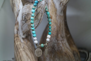Blue Sea Sediment Jasper with white Howlite bead bracelet with silver 'gypsy soul' and feather charms