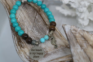 Turquoise gemstone and wood beaded bracelet with silver 'the beach is my happy place' and seahorse charms