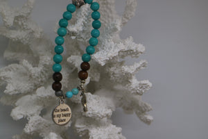 Turquoise gemstone and wood beaded bracelet with silver 'the beach is my happy place' and seahorse charms