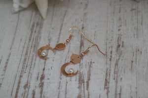 Rose gold pearl earrings with moon charms