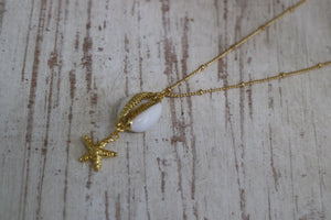 Gold shell necklace with starfish charm