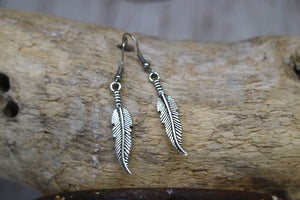 Silver bohemian feather earrings