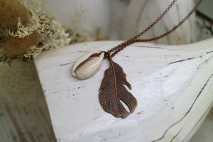 Bohemian copper feather and cowrie shell necklace