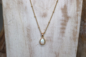 White opal teardrop gold necklace