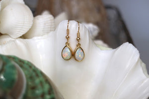 White opal teardrop gold earrings