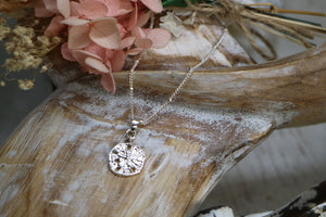 Silver sand dollar shell necklace
