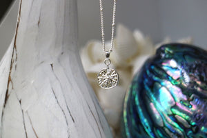 Silver sand dollar shell necklace