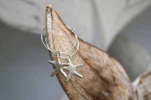 Silver starfish hoop earrings