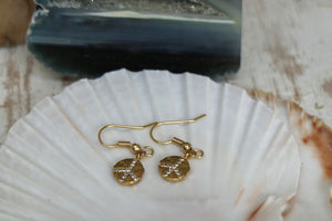 Gold cubic zirconia peace earrings
