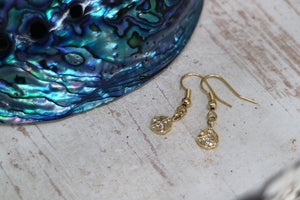 Gold cubic zirconia peace earrings