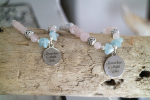 Rose quartz and white howlite and aquamarine bead bracelet with silver charm
