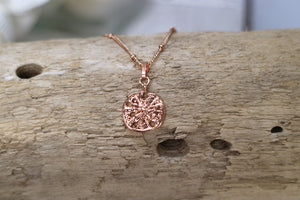 Rose gold sand dollar shell necklace