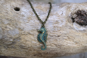 Bronze green patina vintage seahorse necklace