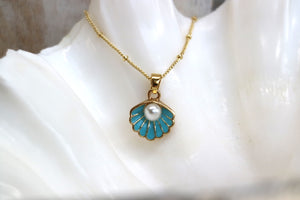Children's blue and gold shell and pearl necklace