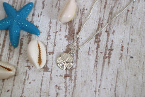 Children's sterling silver sand dollar shell necklace