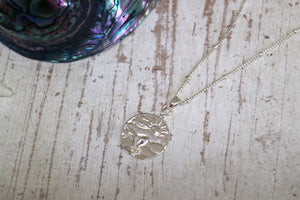 Children's silver sun and whale tail ocean necklace