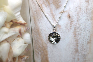 Children's silver sun and whale tail ocean necklace