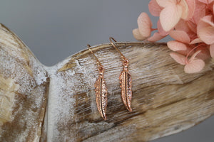 Rose gold feather earrings