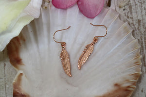 Rose gold feather earrings
