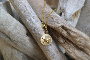 Gold starfish coin necklace