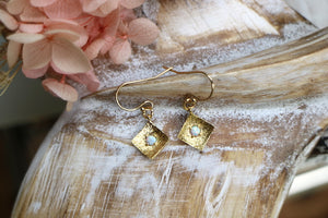 White opal gold earrings