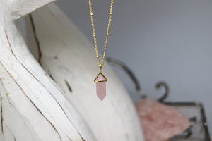Rose quartz crystal point gold necklace