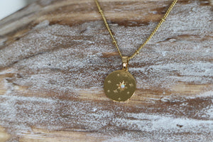 White opal and star gold coin necklace