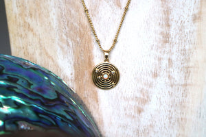 White opal and cubic zirconia coin gold necklace