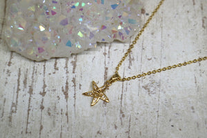 Children's cubic zirconia gold starfish necklace