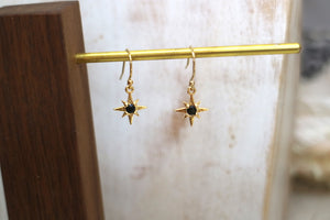 Black onyx and gold star earrings