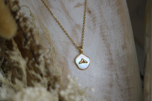Mother of pearl and gold whale tail necklace