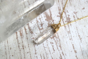 Clear quartz gold necklace