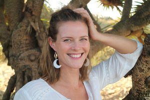 Gold pearl and cowrie shell earrings