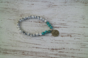 White howlite and blue sea sediment jasper gemstone beaded bracelet with silver 'gypsy soul' charm
