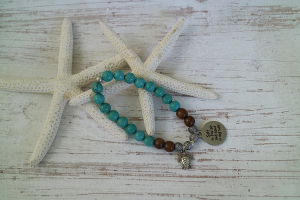 Load image into Gallery viewer, Turquoise and wood beaded bracelet with silver &#39;salt in the air and sand in my hair&#39; and turtle charm
