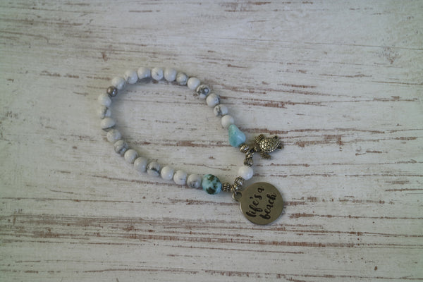Load image into Gallery viewer, White Howlite gemstone and Larimar nugget beaded bracelet with silver &#39;life&#39;s a beach&#39; and turtle charm
