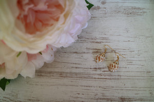 Gold conch shell earrings