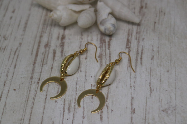 Load image into Gallery viewer, White cowrie sea shell gold earrings with gold plated moon charms
