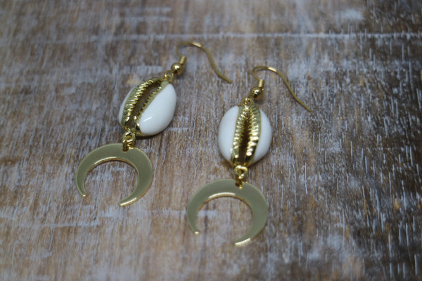 Load image into Gallery viewer, White cowrie sea shell gold earrings with gold plated moon charms

