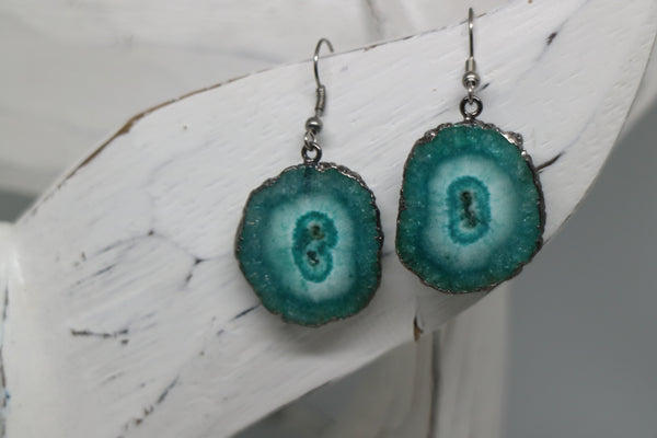 Load image into Gallery viewer, Green solar quartz crystal earrings with black electroplated edges and silver stainless steel earring hooks
