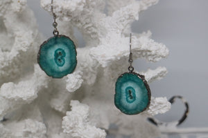 Green solar quartz crystal earrings with black electroplated edges and silver stainless steel earring hooks