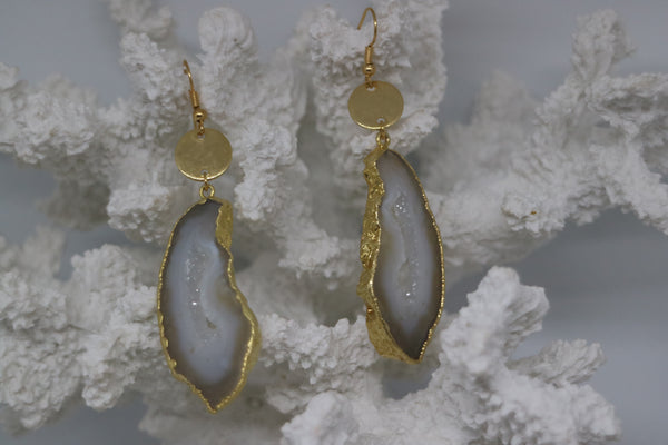 Load image into Gallery viewer, White goede druzy agate earrings with gold plated edges, and 24k gold plated charms
