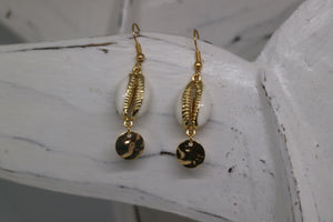 White and gold cowrie sea shell earrings with gold plated charms